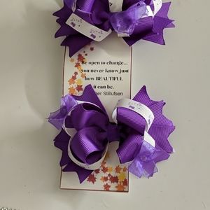 Purple pigtail bows